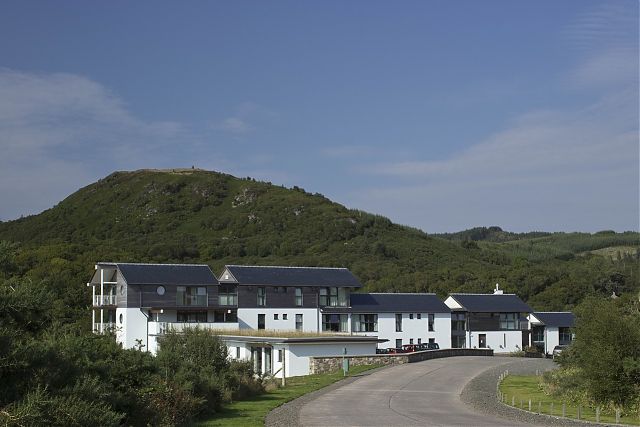 View of Staff Accommodation and Hotel from south with single storey Studio Apartments in foreground. View of Staff Accommodation and Hotel from south with single storey Studio Apartments in foreground.